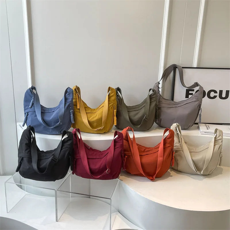 Bolsa de ombro de tecido de náilon nova alta capacidade feminina crossbody saco do mensageiro lazer versátil ombro hobos saco
